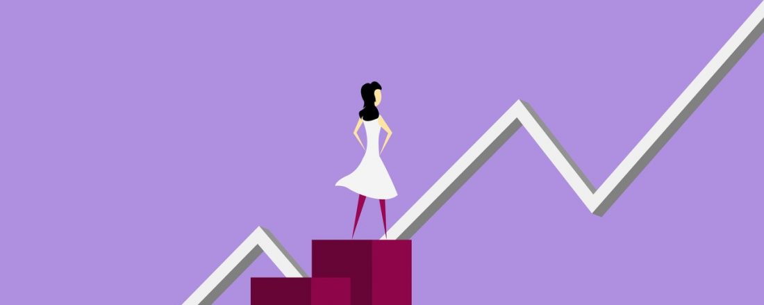 Vector-based graphic of a woman standing on an ascending bar graph. There is also a line graph that is ascending upwards