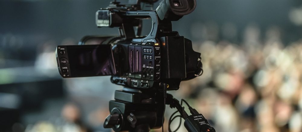 Camera recording the audience of a live event