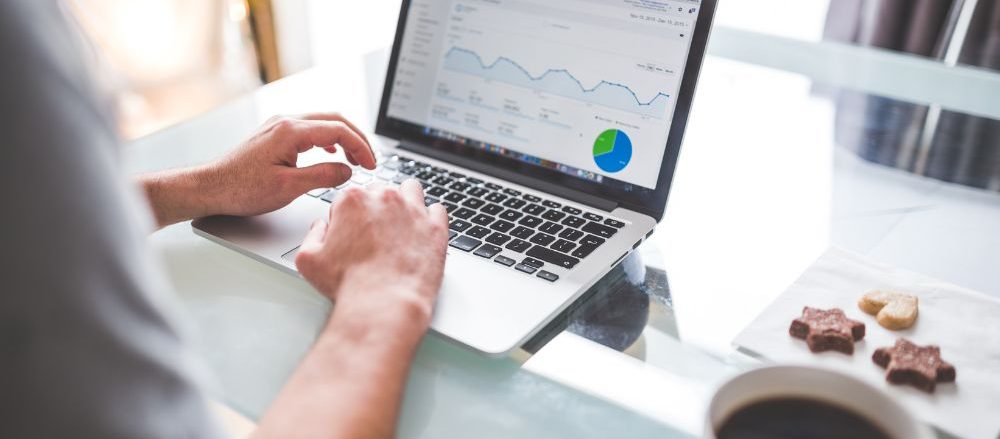 A person examining the analytics page of their association's platform