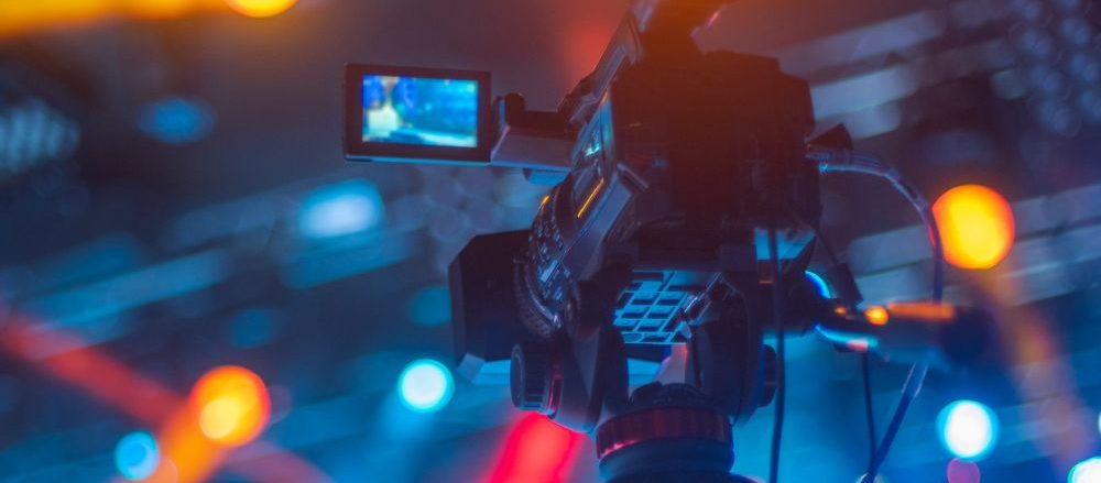 A camera live streams an event.